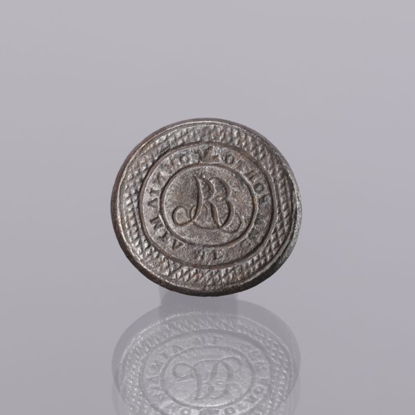 Seal stamp, engraving. Oval, almost circular; central field with engraved monogram ER R