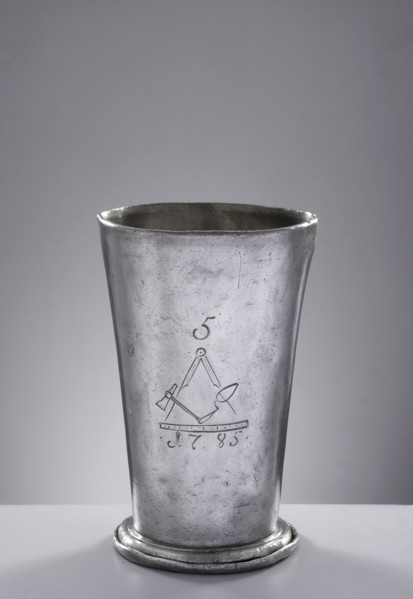 Bricklayers' guild mug. Tin mug of conical shape, set on a profiled convex base with a turned-down