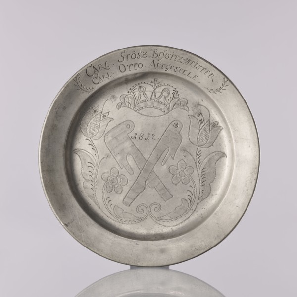Plate by Otto Friedrich Groth fl. 1792–1822. Flat pewter plate with a smooth mirror, semicircular