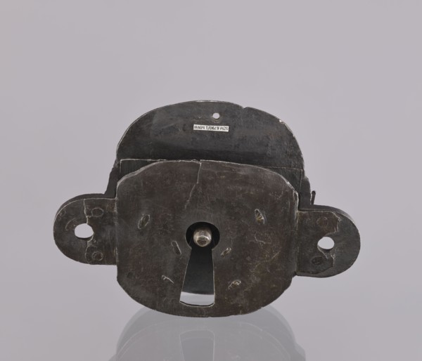Lock register. The register on the bottom plate is in the form of an irregular oval, with two