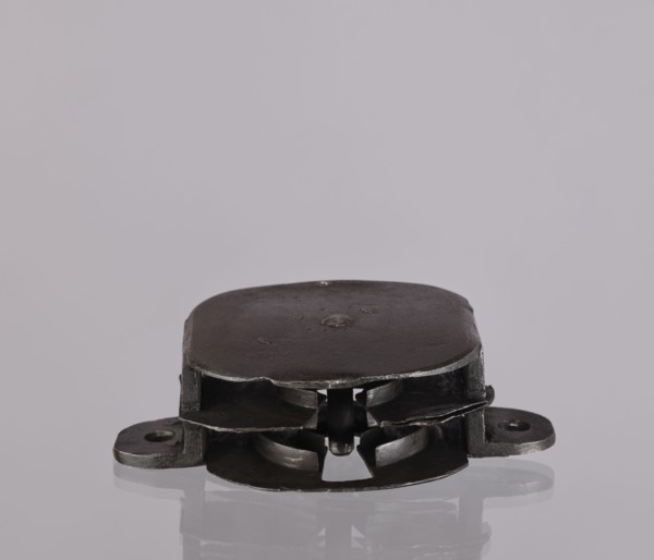 Lock register. The register on the bottom plate is in the form of an irregular oval, with two