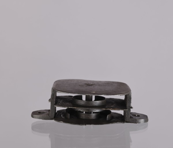 Lock register. The register on the bottom plate is in the form of an irregular oval, with two