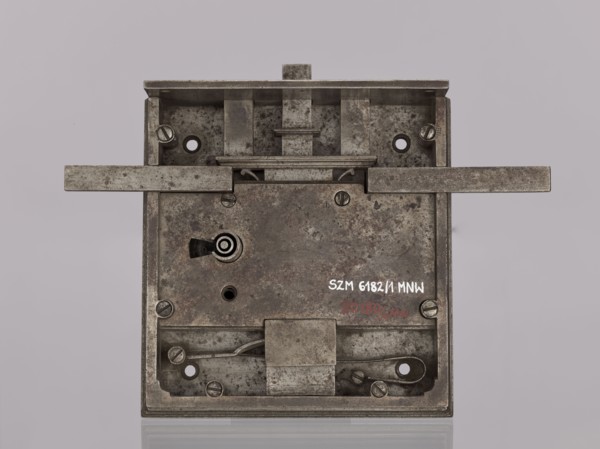 Square-faced door lock with latches and key. Maker: Michal Taszynski fl. 1820–1838. Made 1861 for