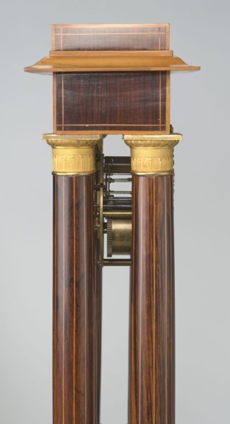 Mantel clock by Alexandre Pertrand fl. ca. 1840. Four-column portico form on a cuboid base and