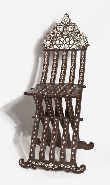 Chair with footrest, seat, and backrest composed of five slatted elements, richly inlaid with bone