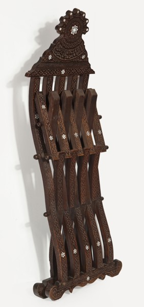 Chair, rosettes ornament, geometric ornament, Kufi script. Scissor chair with footrest, seat, and