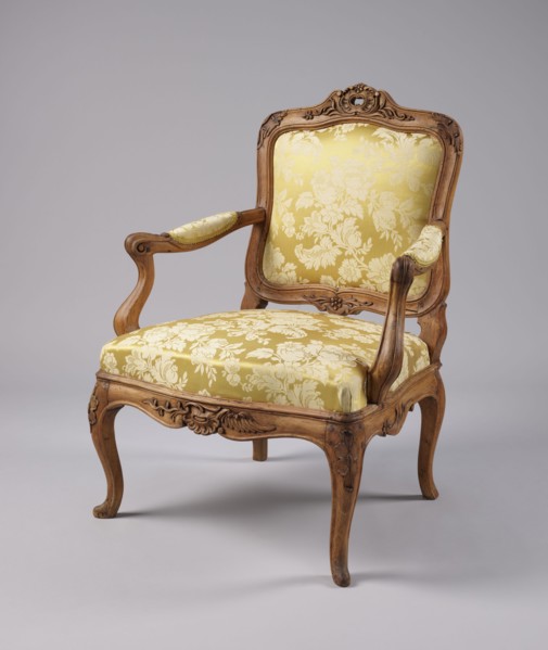 Armchair, rococo style, carved and upholstered seat, backrest and armrests, on four cabriole legs