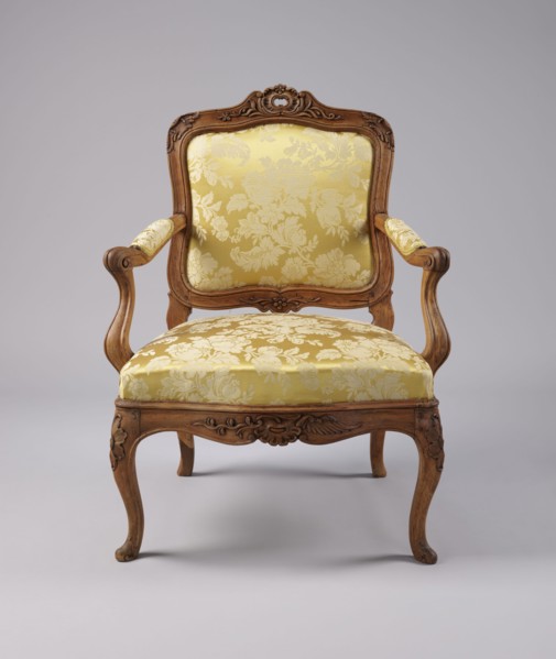 Armchair, rococo style, carved and upholstered seat, backrest and armrests, on four cabriole legs