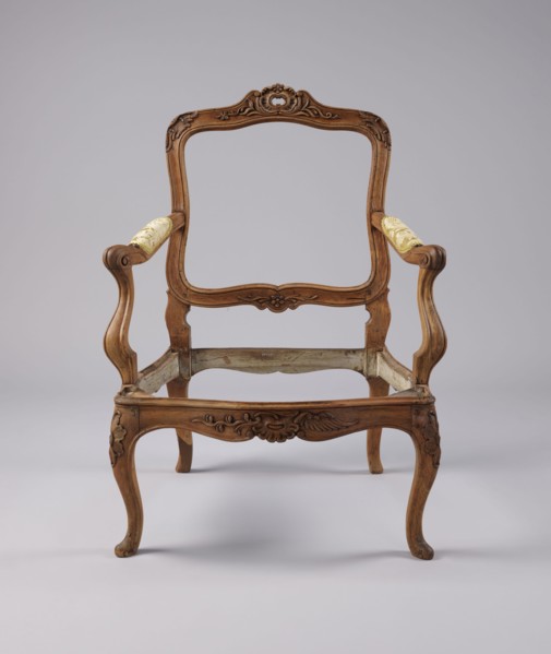 Armchair, rococo style, carved and upholstered seat, backrest and armrests, on four cabriole legs