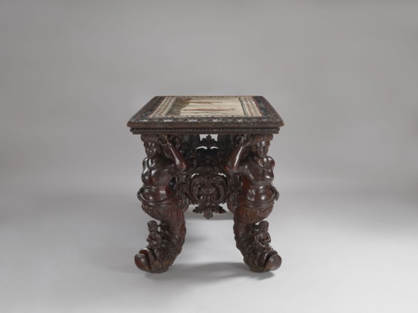 Table, Neo-Baroque, richly carved table with a rectangular mosaic top supported by four supports in