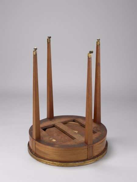 Table, classicism style, geometric ornament, round mahogany table with a white marble top enclosed