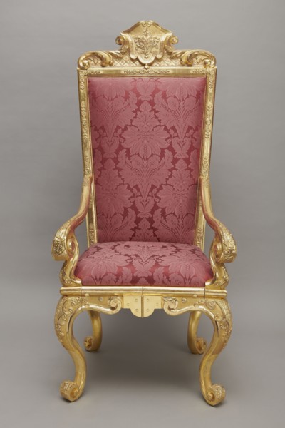 Travel armchair, late Baroque type, carved and gilded, with a high flat backrest, on cabriole legs