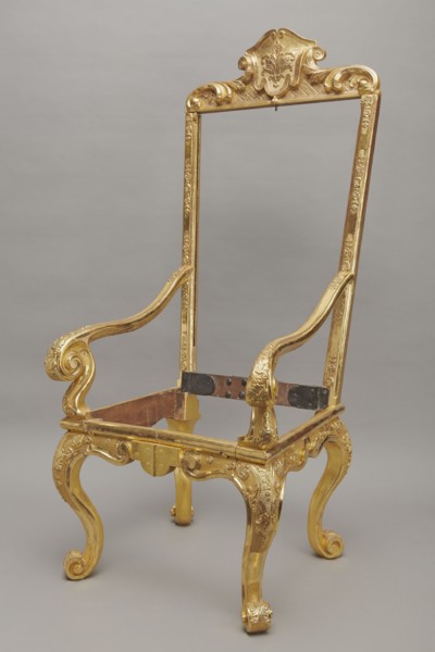 Travel armchair, late Baroque type, carved and gilded, with a high flat backrest on cabriole legs