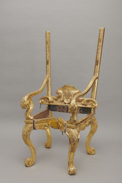 Travel armchair, late Baroque type, carved and gilded, with a high flat backrest, cabriole legs