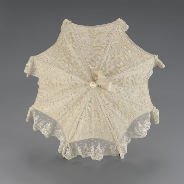 Umbrella, women's umbrella made of white lace. Canopy trimmed with cream silk at the bottom,