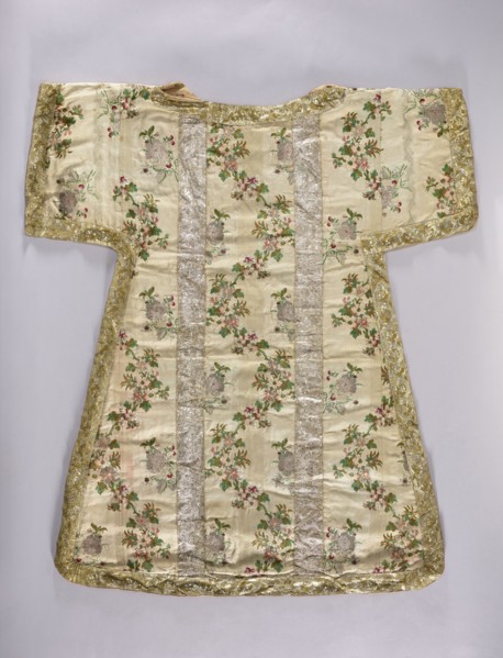 Dalmatic, origin, 18th century, France; liturgical vestment fabric decorated with flowers, leaves,