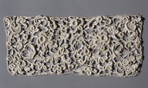 Lace fragment, Plant ornaments and plant tendril; contours of flowers and leaves executed in relief
