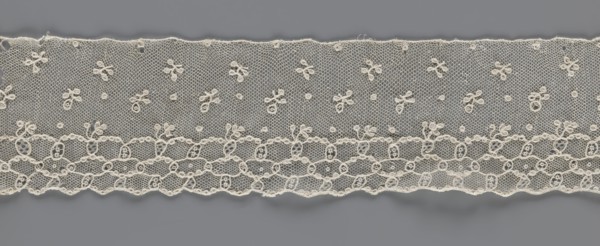 Lace fragment, edge ornament on one side — a kind of net with numerous loops small, round and