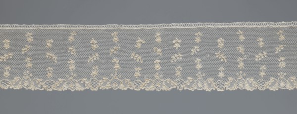 Fragment of lace;, One-sided strip of edge ornament made of plant forms: motif of a pinnately