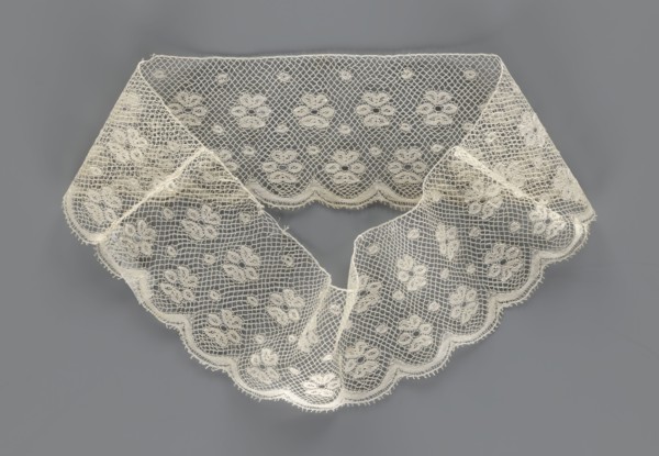 Fragment of lace, section of a belt sewn into a closed circle with one-sided arched serrations.