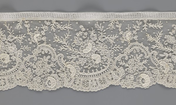 Lace fragment, lace with floral ornaments, rocaille motifs, over-stylized fan-shaped ribbons with