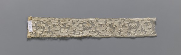 Two fragments of appliqués on batiste tulle: a with a floral tendril pattern; b with a fragment of