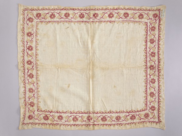 Church napkin. Napkin of white linen canvas edged with a band embroidered with silk and gold thread