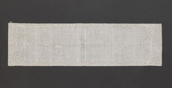 Church napkin. Napkin of white, thin, sparsely woven plain-weave batiste, embroidered with silk