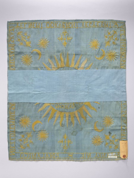 Church napkin. Blue silk rep cloth embroidered with gold thread. In the center, within a radiant