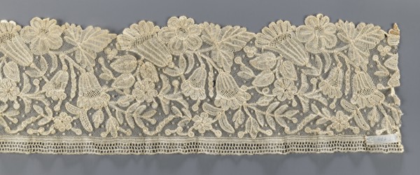 Lace fragment, floral ornaments; fragment of bobbin lace with relief edges made with a needle on a