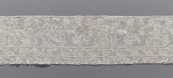 Lace fragment, bobbin lace Binche lace, 18th century. Background: mesh with large, rounded meshes.