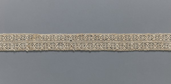 Fragment of lace, needle lace, 16th/17th century, Flanders; width 2.8 cm, length 55 cm;, A