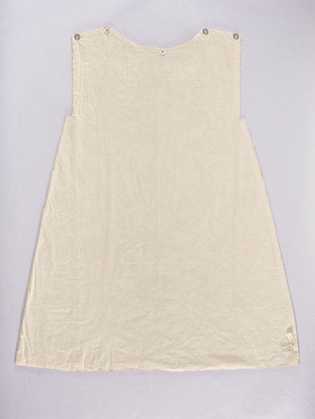 Two fragments of a dalmatic, front and back, of silk fabric interwoven with silver thread.