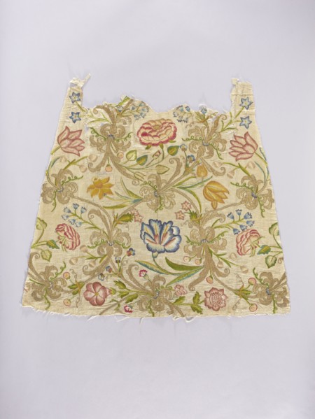 Two fragments of a dalmatic, embroidery on silk fabric interwoven with silver thread, front and