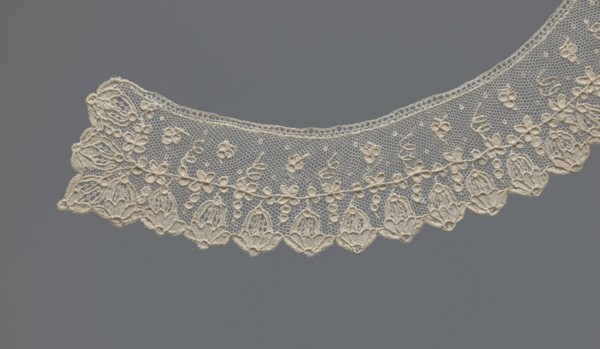 Collar, 19th century, France, band-style arched collar of equal width. Floral ornament set against