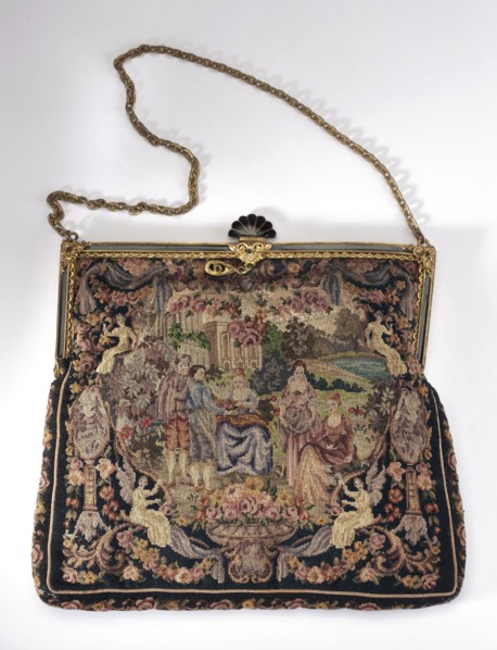 Women's handbag. Handbag in the shape of a rectangle, slightly narrowed at the top. Embroidered