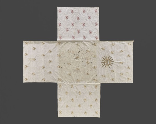 Church napkin. Thin white linen sewn from five rectangular pieces in the shape of a cross.