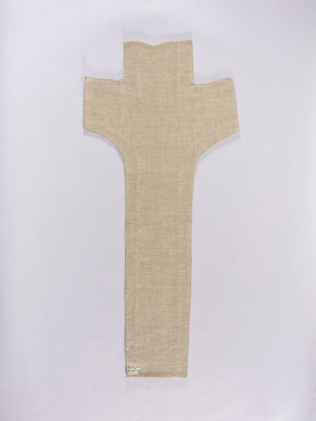 Embroidered Y-shaped chasuble pretext with a depiction of Christ on the cross, surrounded by a