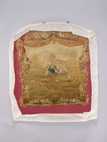 Tapestry covering, provenance, depicts flowers, floral ornaments, dogs, boys, pastoral scenes; used