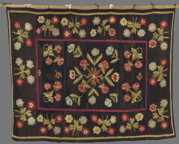 Kilim, 19th century, Poland. Wool fabric, height 214 cm, width 167 cm. In the center is a