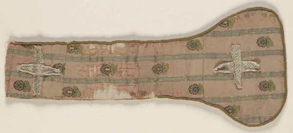 Fragment of a maniple made of crimson silk fabric with a striped and fine-thread motif. Salmon