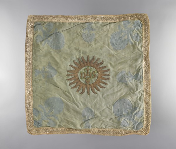 Velum., Velum made of blue silk fabric. In the center is an applied radiant medallion with the IHS