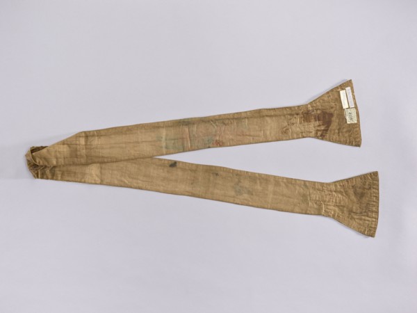 Stole made of silk fabric with olive-colored stripes. Embroidered with a pattern of leaves on the