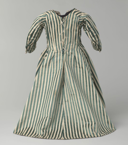 Children's dress, 18th century clothing, fashion. Children's dress made of satin with green and
