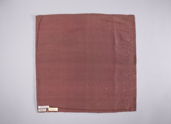 Velum of dark red satin embroidered around the edges with gold and silver thread in motifs of