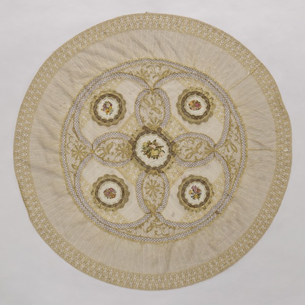 Doily, unknown creator; round doily sewn from two pieces of machine lace, bobbin lace, and fabric