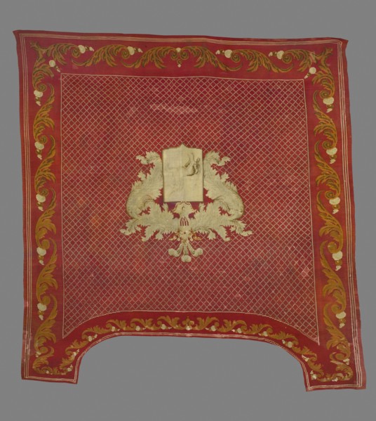 Saddle pad — kilim in a near-square form with slightly elongated upper corners. Main field: