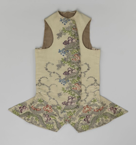 Vest, floral and plant ornaments, patterned fabrics. Predominant ornamental colors: silver, plum,