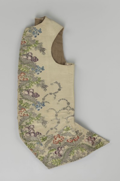 Vest, floral and plant ornaments, patterned fabrics. Predominant ornamental colors: silver, plum,
