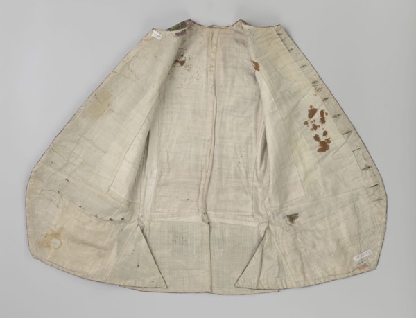Vest, floral ornaments, patterned fabrics, Fastened to the neck with 11 buttons. Flaps on the